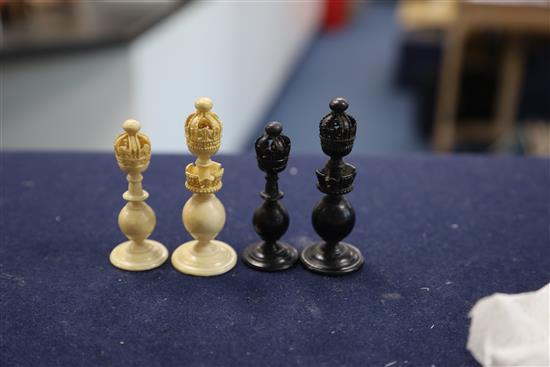 A mid 19th century Anglo Indian turned black stained and natural ivory chess set, kings 3.5in.